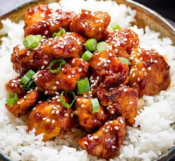 Crispy Sesame Chicken With A Sticky Asian Sauce Beverley Copy Me That