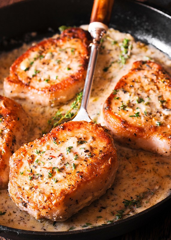 Pork Chops in Creamy Garlic and Herb Wine Sauce | allebull | Copy Me That