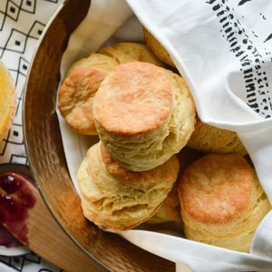 The Biggest fattest Fluffiest All Butter Biscuits are everything you ever wanted in a homemade biscuit recipe. Flaky tender layers, butter, and perfectly browned tops. The height on these babies is ridiculous.